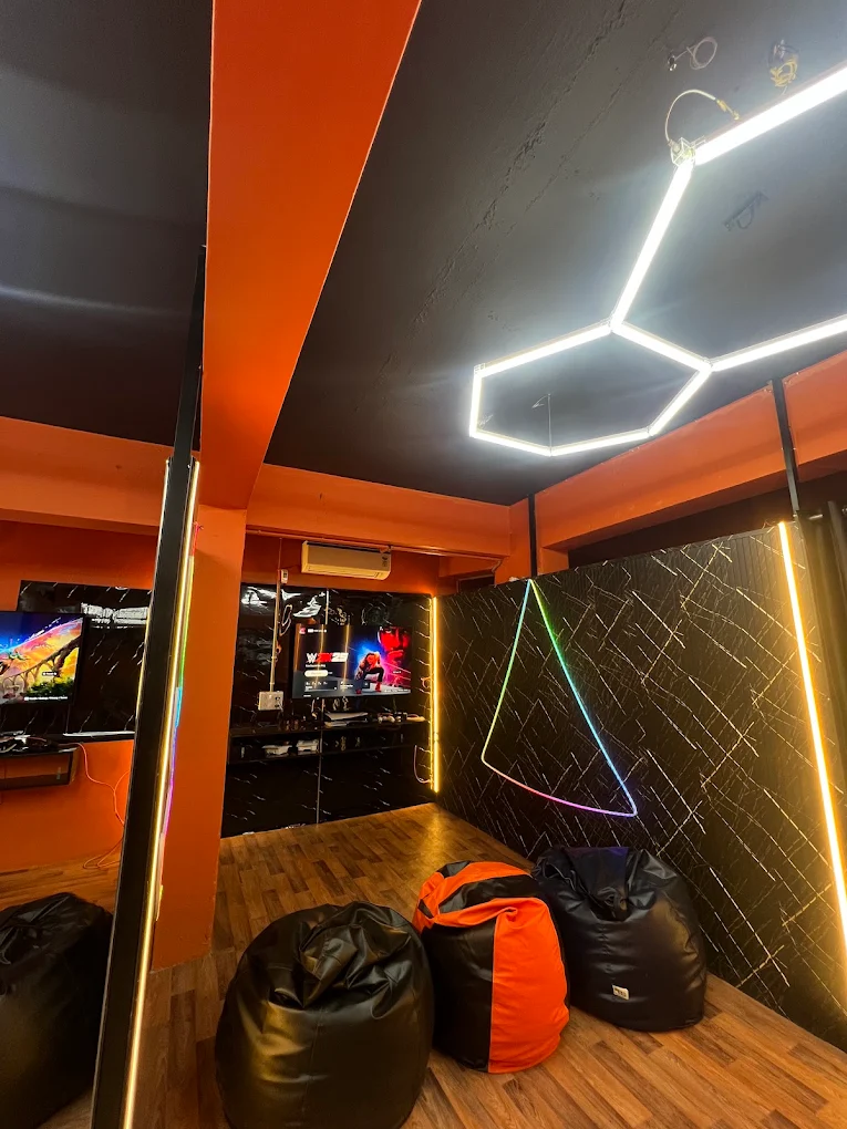 PS5 gaming setup with illuminated wall art